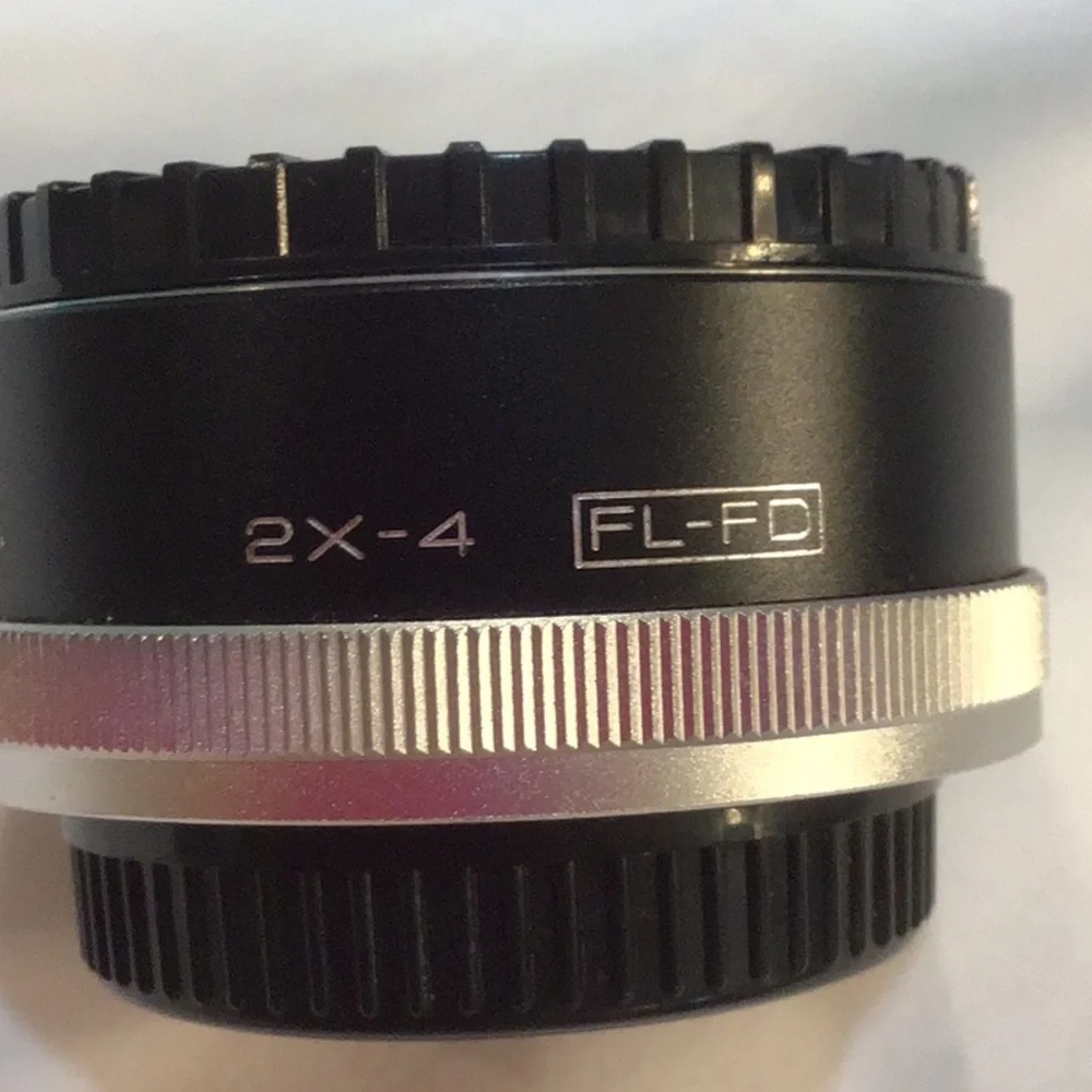 Vivitar lens MC tele converter 2 x4 FL FD